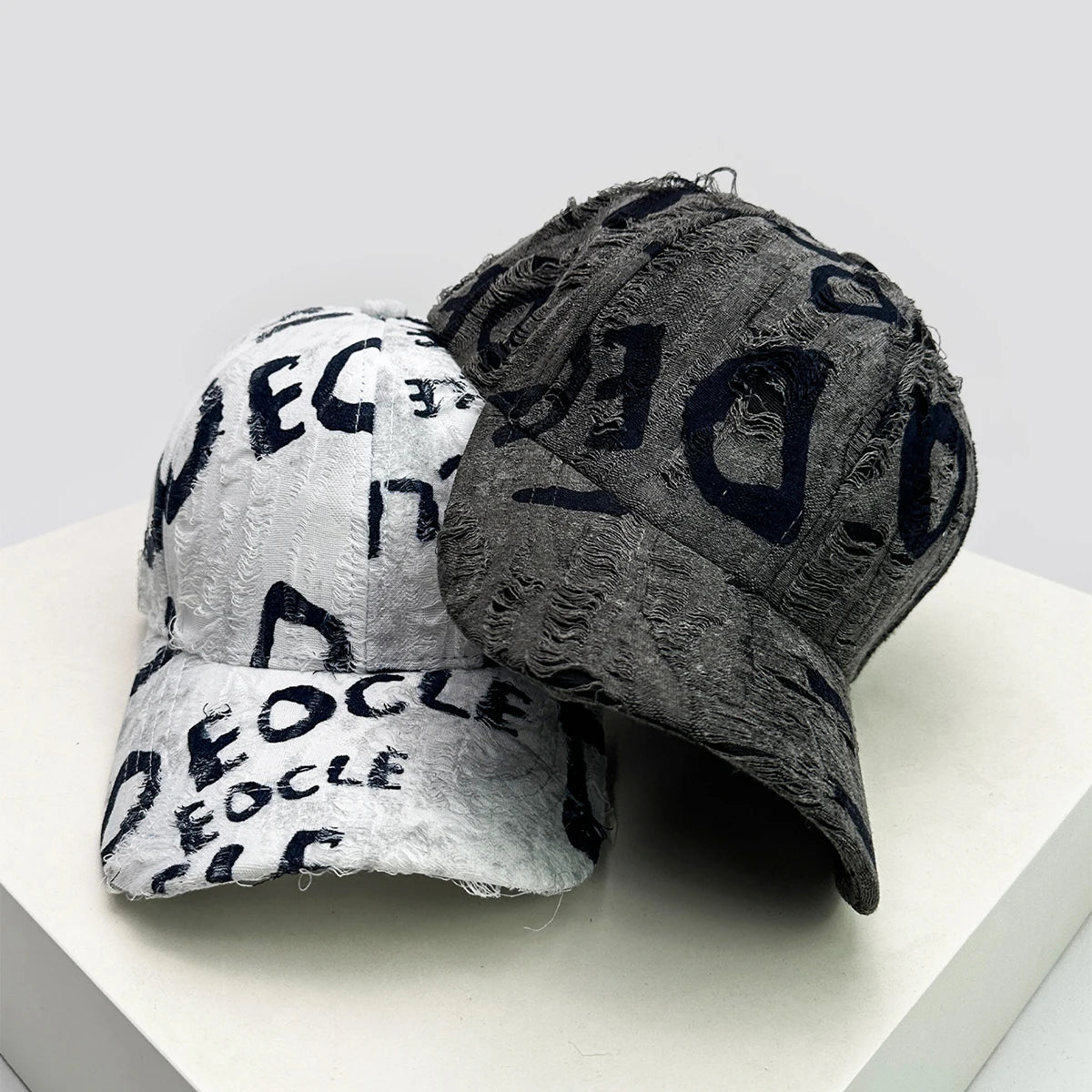 GLYPH Distressed Letter Cap-Cap-SAINT CHIC-Cream Grunge-SAINT CHIC