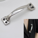 Metallic handle on a white background with a close-up of the handle on a black jacket.