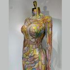 Colorful dress on a mannequin against a plain background