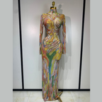 Colorful patterned dress on a mannequin against a plain background