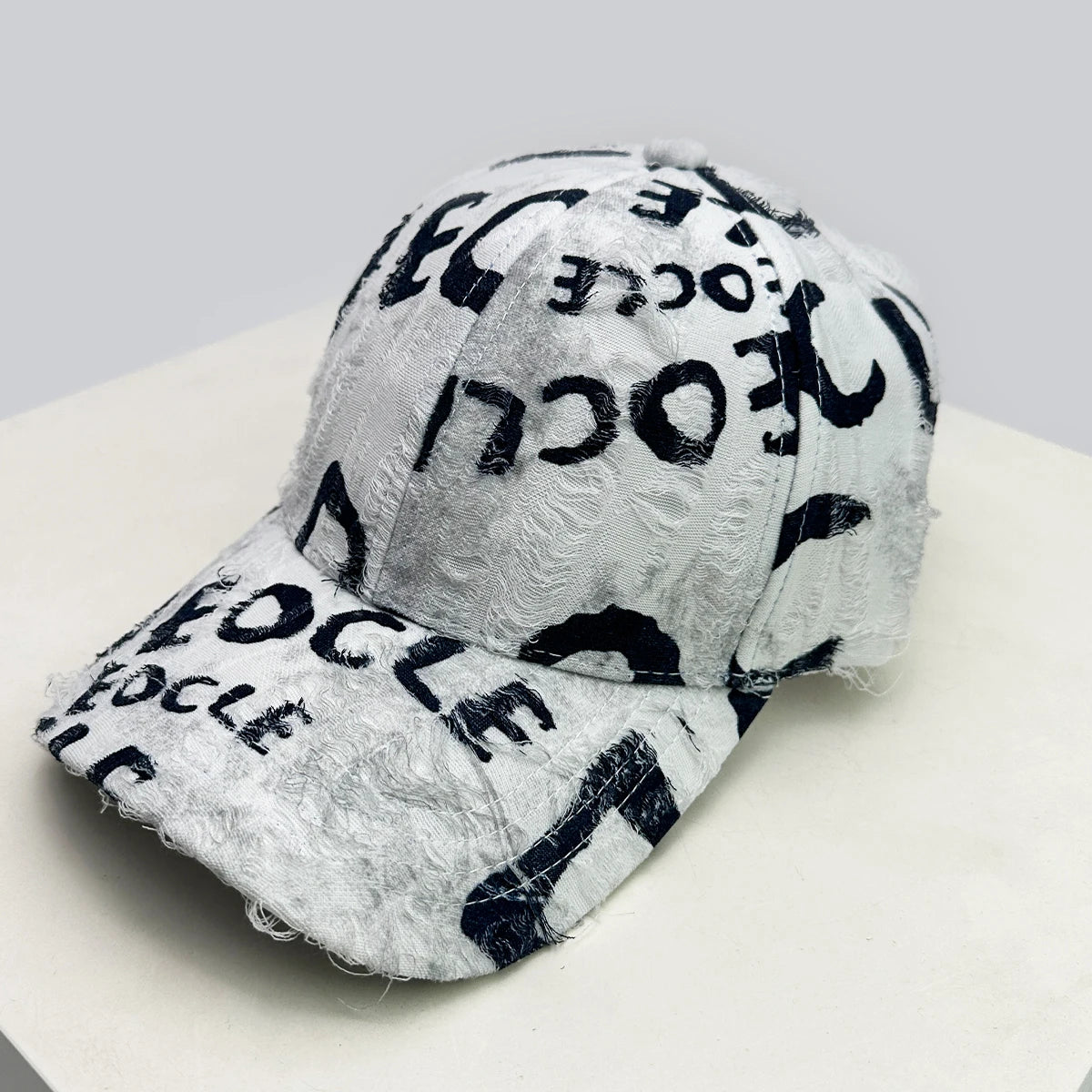 GLYPH Distressed Letter Cap